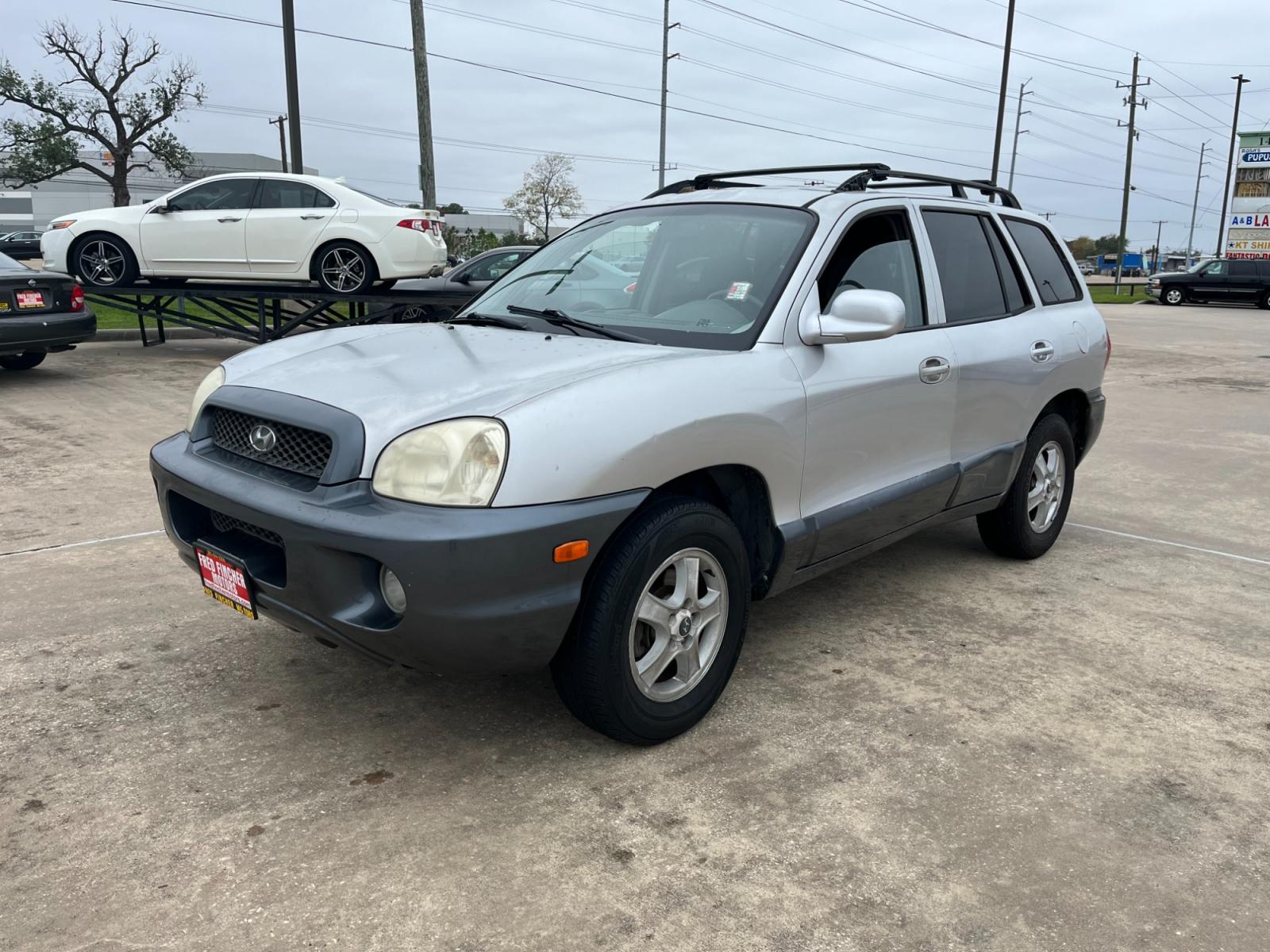 2003 SILVER /gray Hyundai Santa Fe GLS (KM8SC13D53U) with an 2.7L V6 DOHC 24V engine, 4-Speed Automatic Overdrive transmission, located at 14700 Tomball Parkway 249, Houston, TX, 77086, (281) 444-2200, 29.928619, -95.504074 - Photo #2